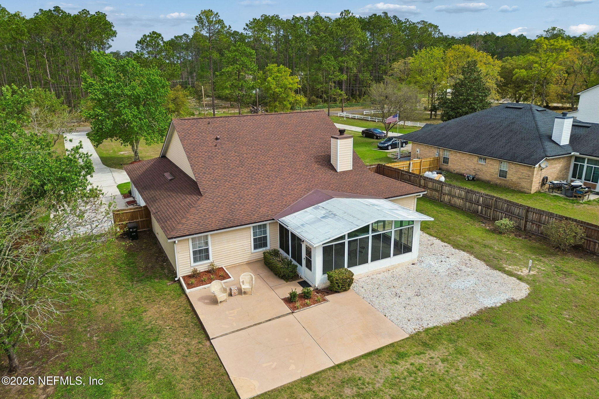 10293 Ford Road Bryceville, FL 32009 - Photo 56 of 63 an aerial view of a house with swimming pool