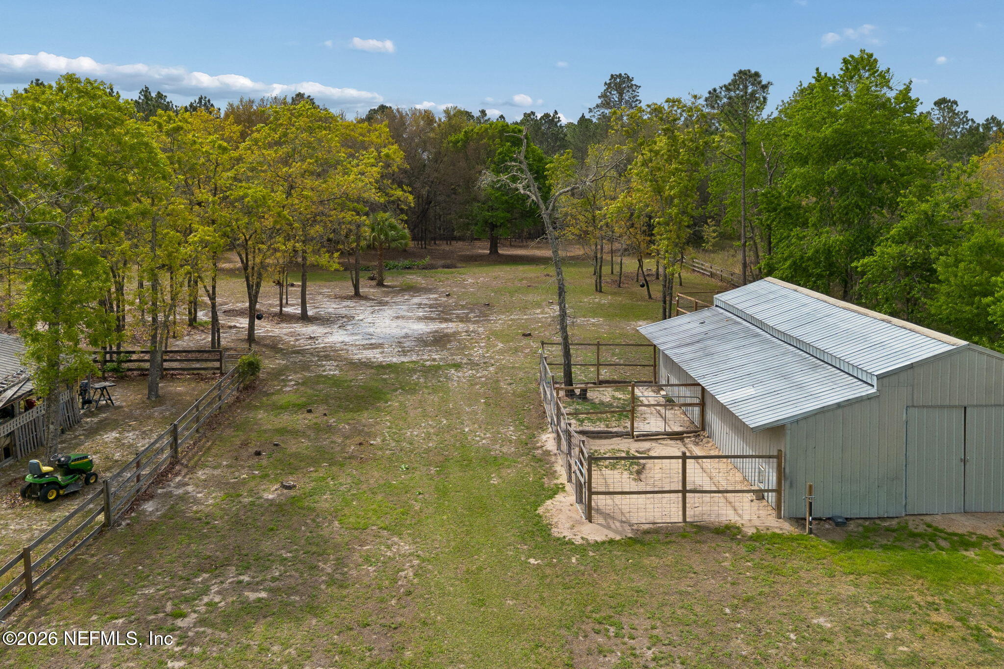 10293 Ford Road Bryceville, FL 32009 - Photo 58 of 63 a view of a small house with pool