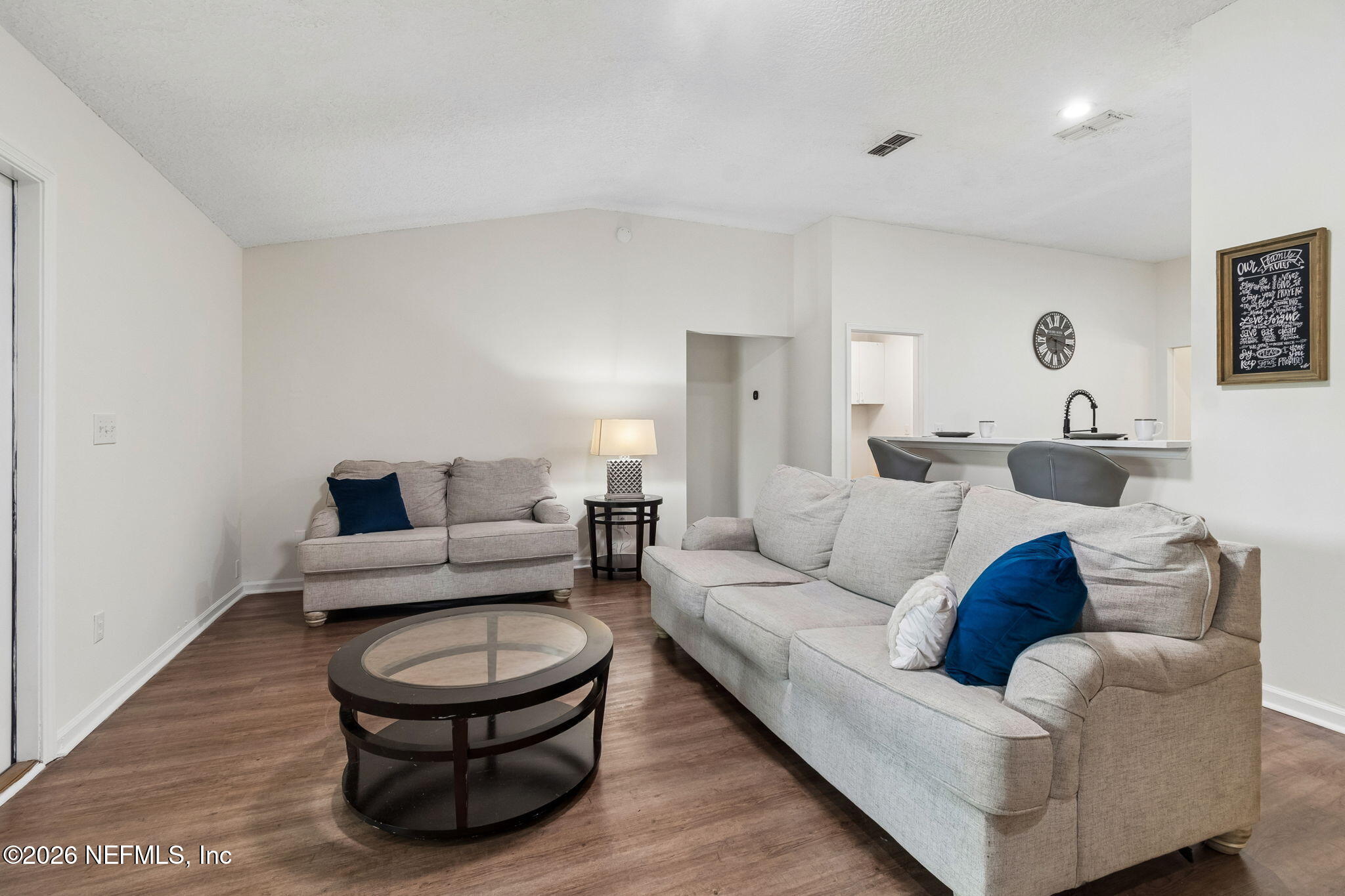 10293 Ford Road Bryceville, FL 32009 - Photo 10 of 63 a living room with furniture and a wooden floor