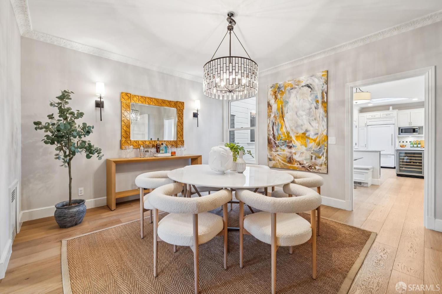 3641 Webster Street San Francisco, CA 94123 - Photo 18 of 52 a living room with furniture and a chandelier