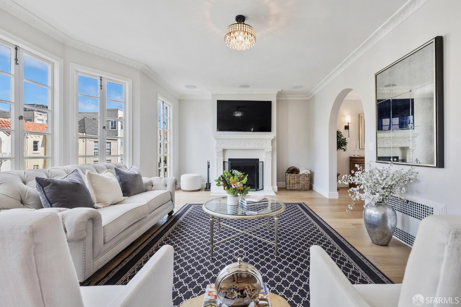 Webster Street San Francisco, CA 94123 - Photo 22 of 83 a living room with furniture a fireplace and a flat screen tv