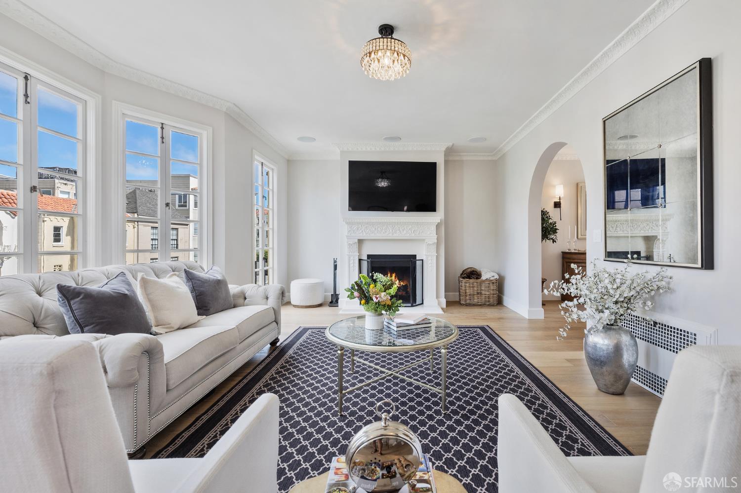 Webster Street San Francisco, CA 94123 - Photo 23 of 83 a living room with furniture a fireplace and a flat screen tv