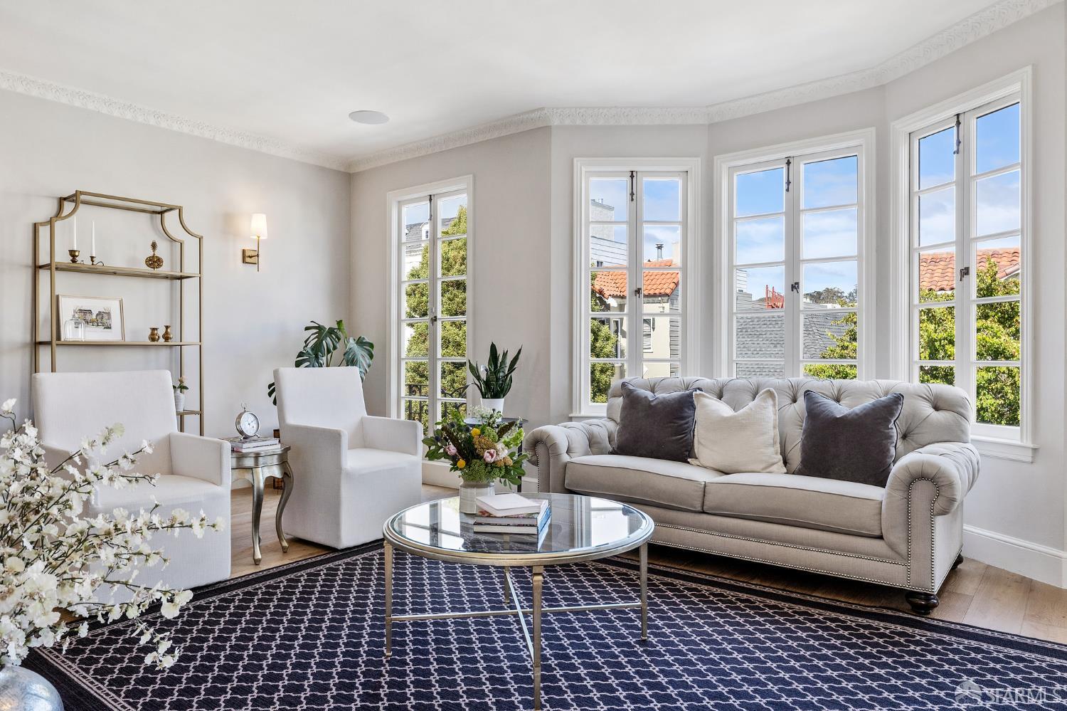 Webster Street San Francisco, CA 94123 - Photo 27 of 83 a living room with furniture and large window with garden view
