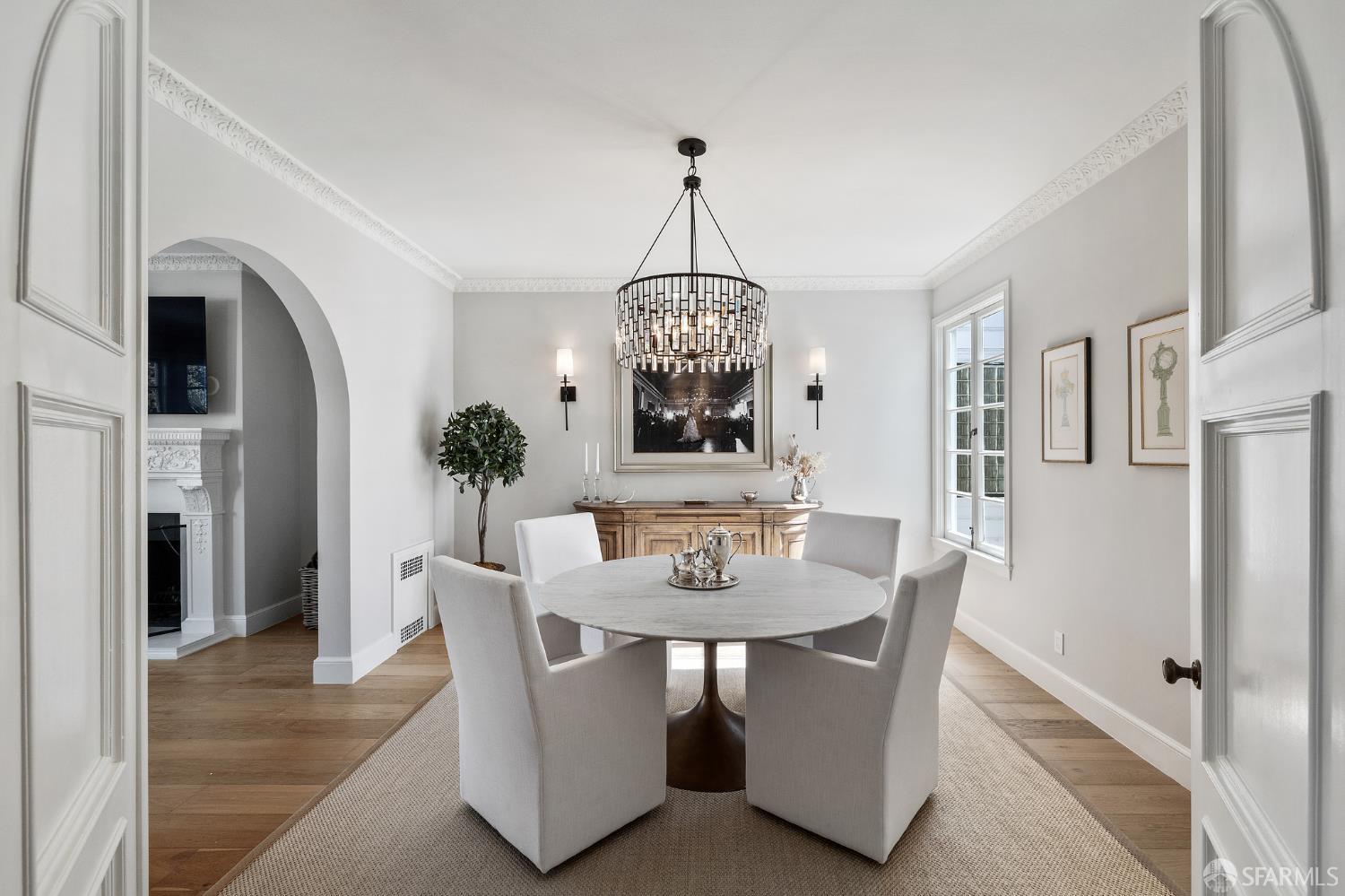 Webster Street San Francisco, CA 94123 - Photo 35 of 83 a dining room with furniture a chandelier and wooden floor