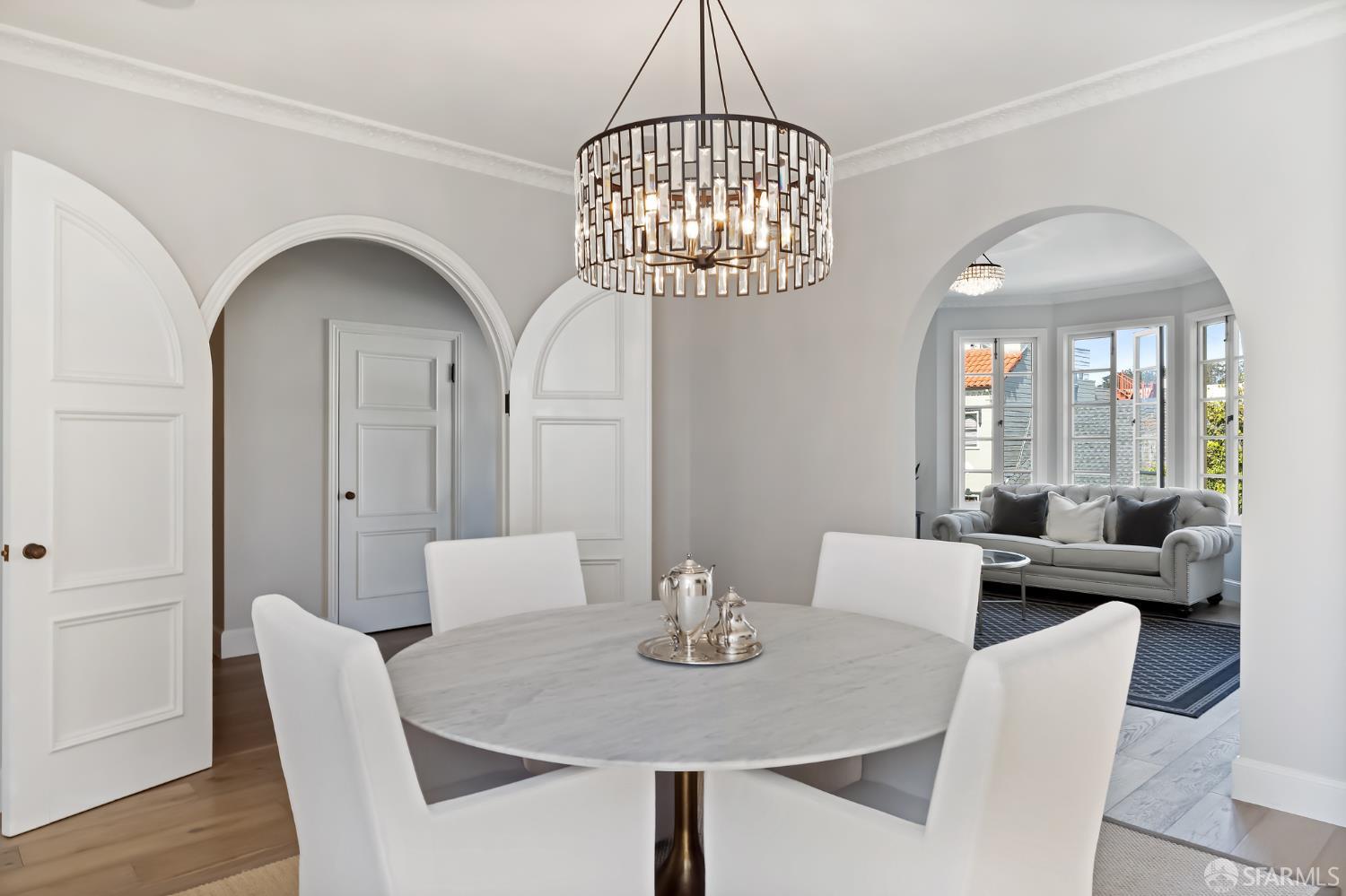 Webster Street San Francisco, CA 94123 - Photo 36 of 83 a view of a dining room with furniture a chandelier and wooden floor