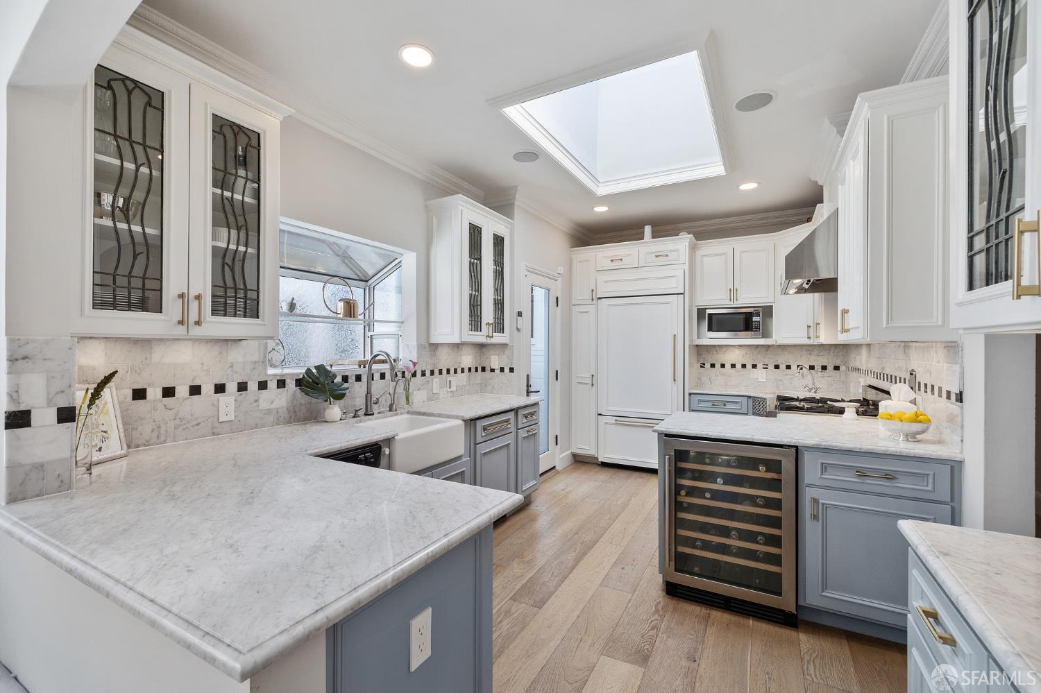 Webster Street San Francisco, CA 94123 - Photo 42 of 83 a kitchen with stainless steel appliances a sink and stove