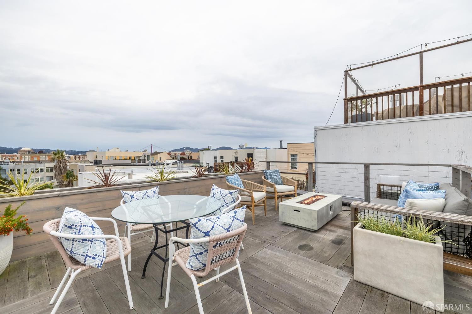 3641 Webster Street San Francisco, CA 94123 - Photo 42 of 52 a balcony with table and chairs