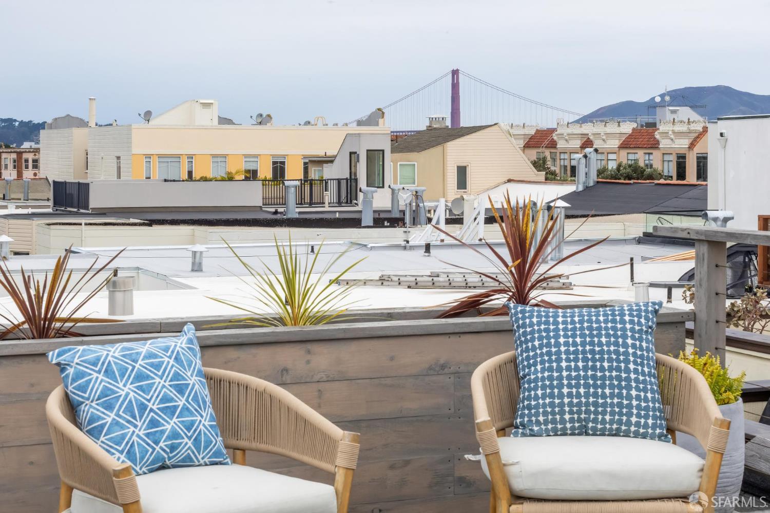 3641 Webster Street San Francisco, CA 94123 - Photo 45 of 52 a view of living room kitchen with furniture and wooden floor