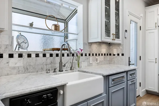 a view of a terrace with couches and city view