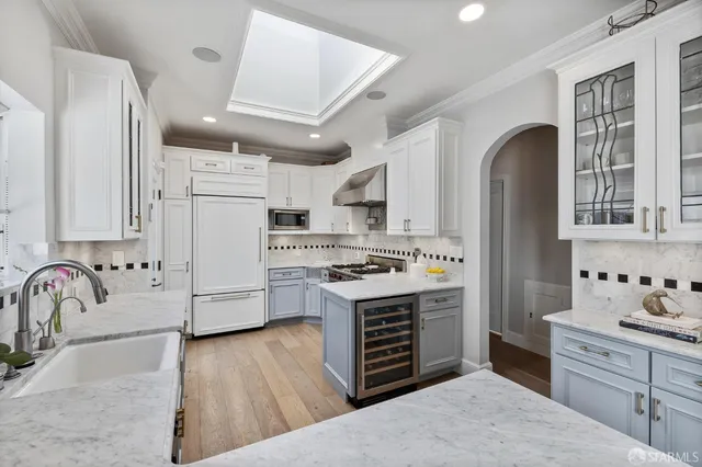 a view of a terrace with couches and sky view