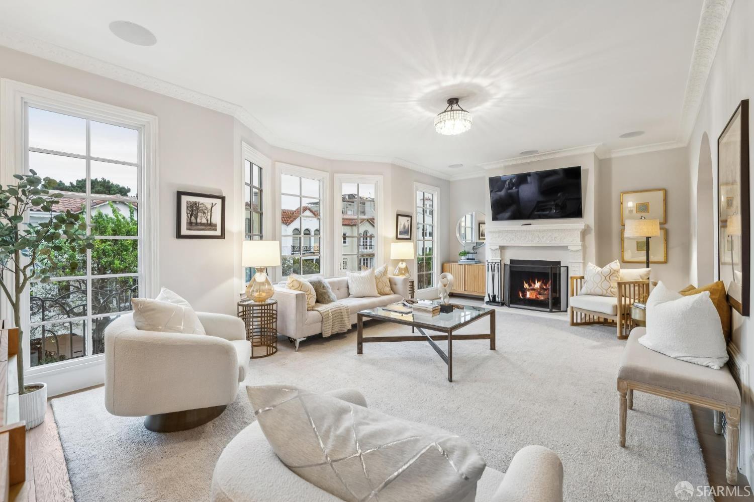 3641 Webster Street San Francisco, CA 94123 - Photo 9 of 52 a living room with furniture fireplace and a large window