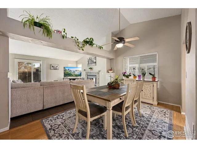 a view of a dining room with furniture and a livingroom