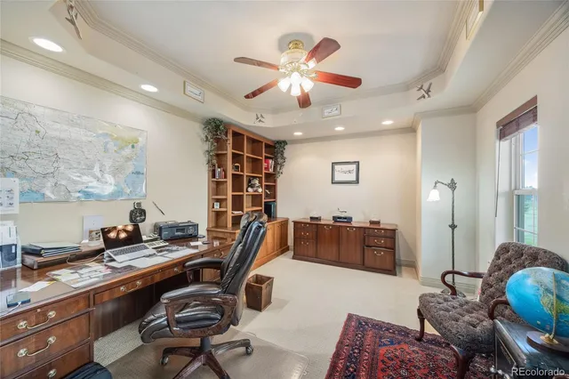 a workspace with furniture and window