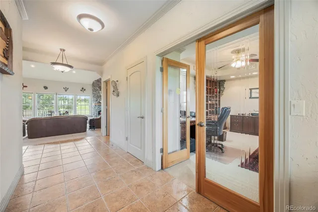 a view of a bathroom with a tub and shower