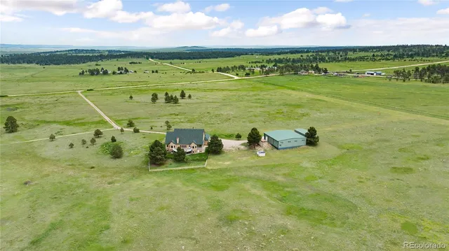 a view of a lake with a big yard