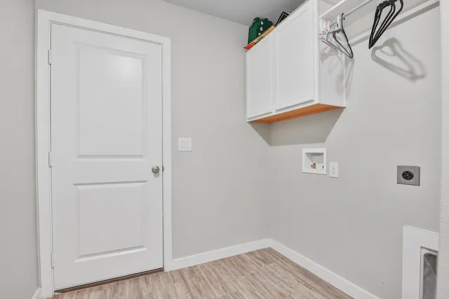 a view of small space with wooden floor