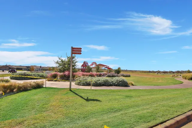 a view of a garden and mountain