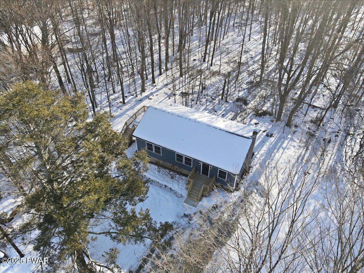 10 Swingle Road Moscow, PA 18444 - Photo 45 of 60 a house with trees in front of it