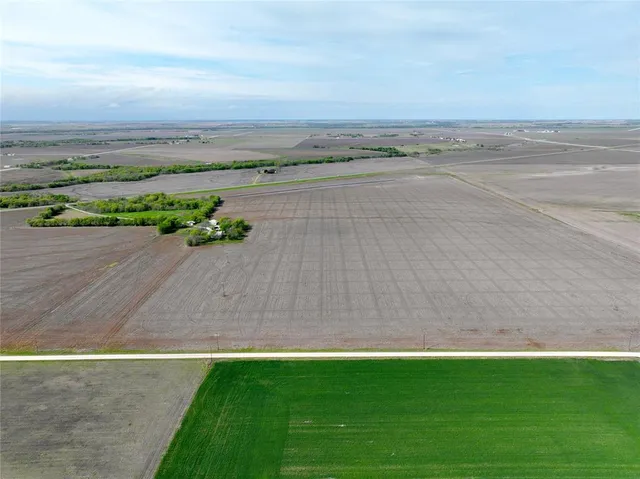 a view of an ocean and a yard