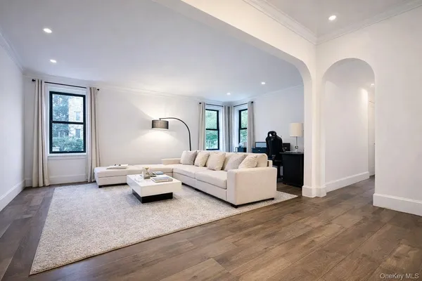 a living room with furniture and window