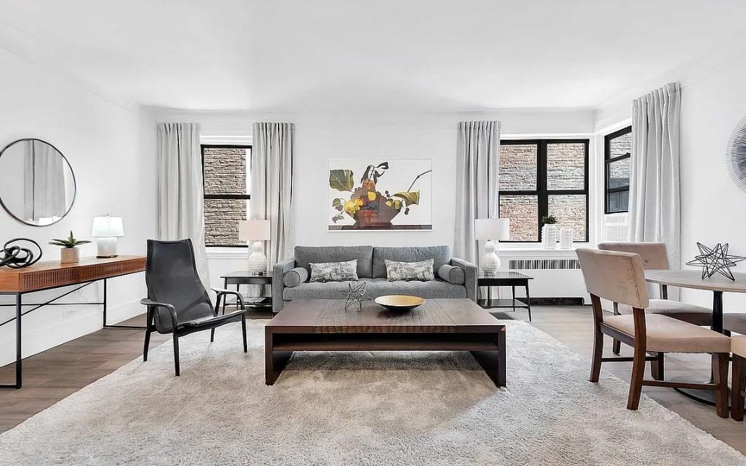 Living room with radiator and wood finished floors