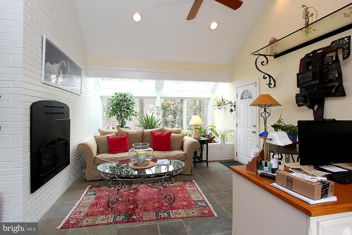 8912 Burdette Road Bethesda, MD 20817 - Photo 8 of 29 Sun Room/Office with gas fireplace