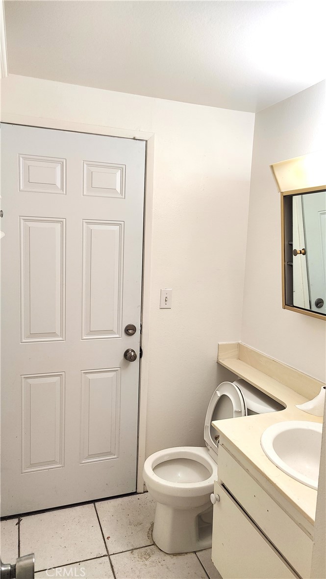 2821 Greenleaf Drive West Covina, CA 91792 - Photo 25 of 32 a white toilet sitting next to a bathroom sink