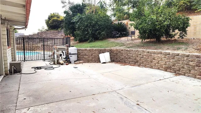 a view of a yard with patio