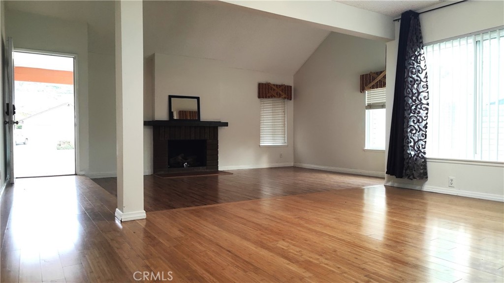 2821 Greenleaf Drive West Covina, CA 91792 - Photo 8 of 32 a view of empty room with wooden floor and fan