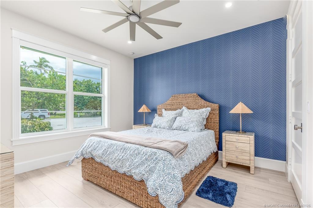 1879 Northwest River Trail Stuart, FL 34994 - Photo 13 of 25 a bedroom with a bed and a window