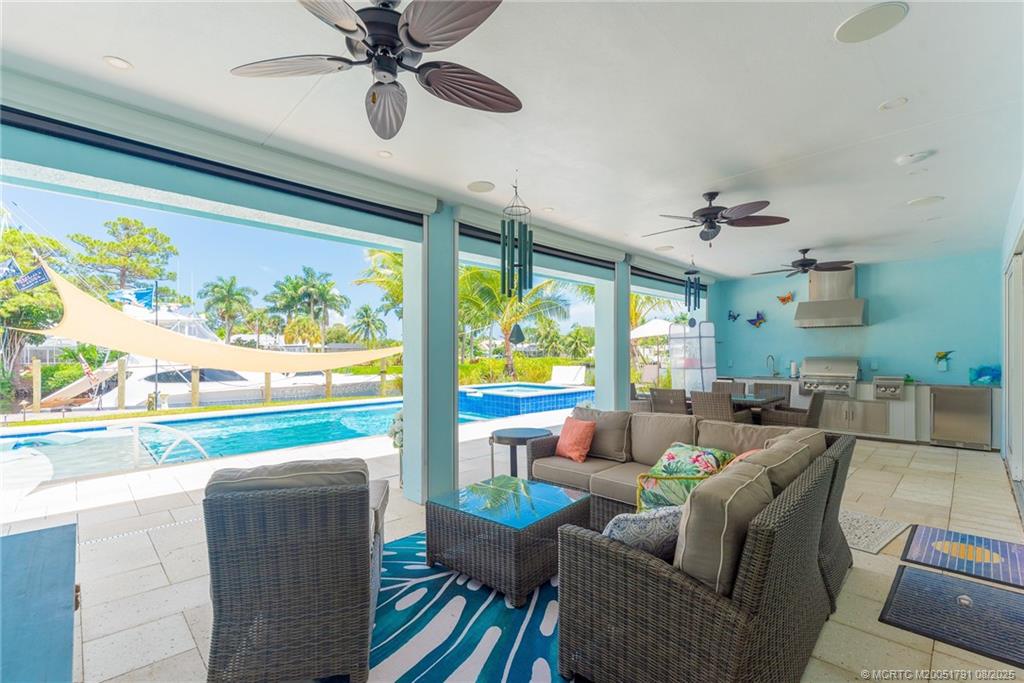 1879 Northwest River Trail Stuart, FL 34994 - Photo 17 of 25 a living room with furniture and a large window