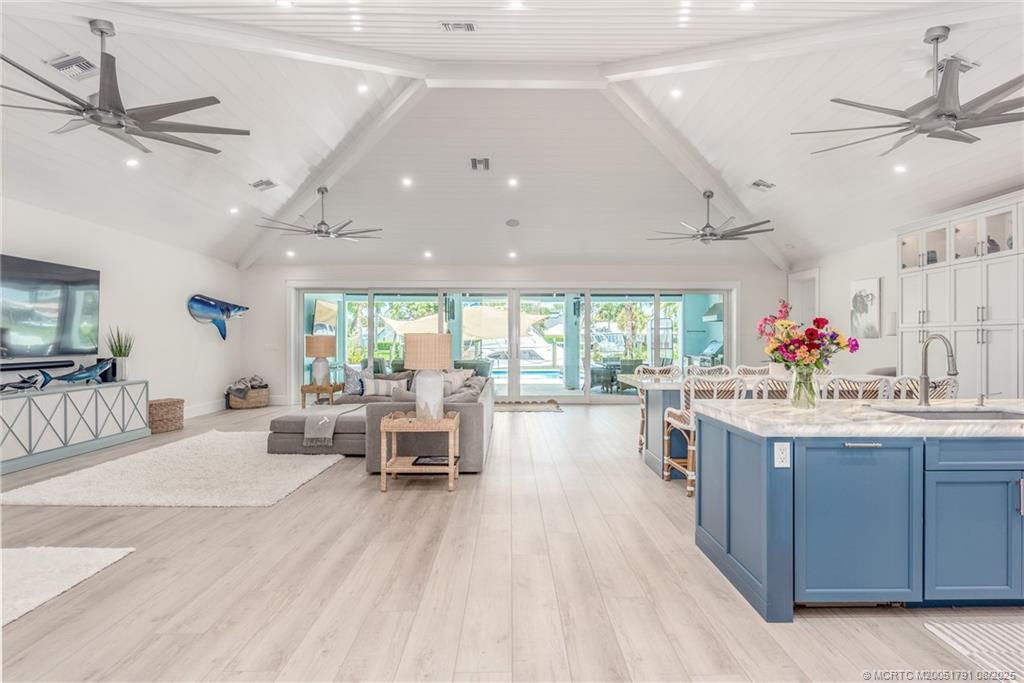 1879 Northwest River Trail Stuart, FL 34994 - Photo 3 of 25 a living room with furniture and a large window