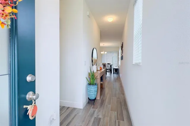 view of livingroom with hardwood floor and hallway
