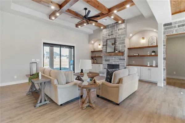 a bathroom with a double vanity sink mirror and shower