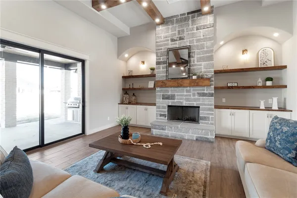 a white bath tub sitting next to a bathroom
