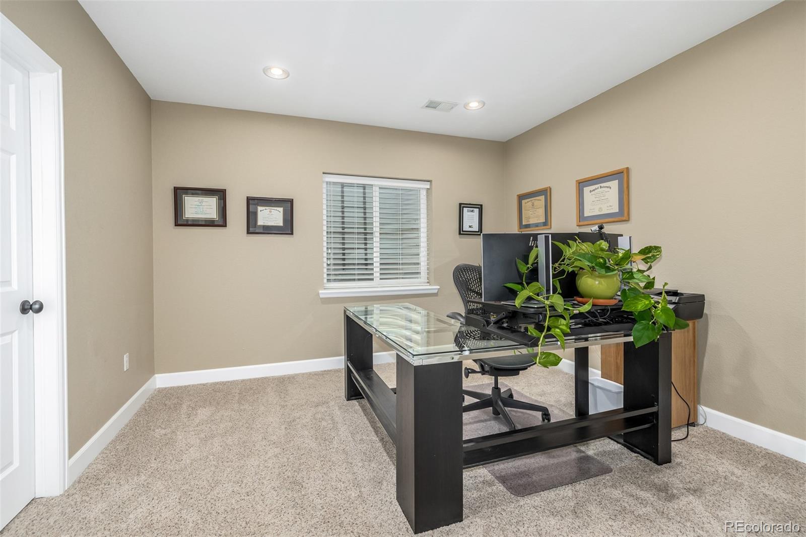 14704 Eagle River Loop Broomfield, CO 80023 - Photo 23 of 30 a workspace with furniture and window