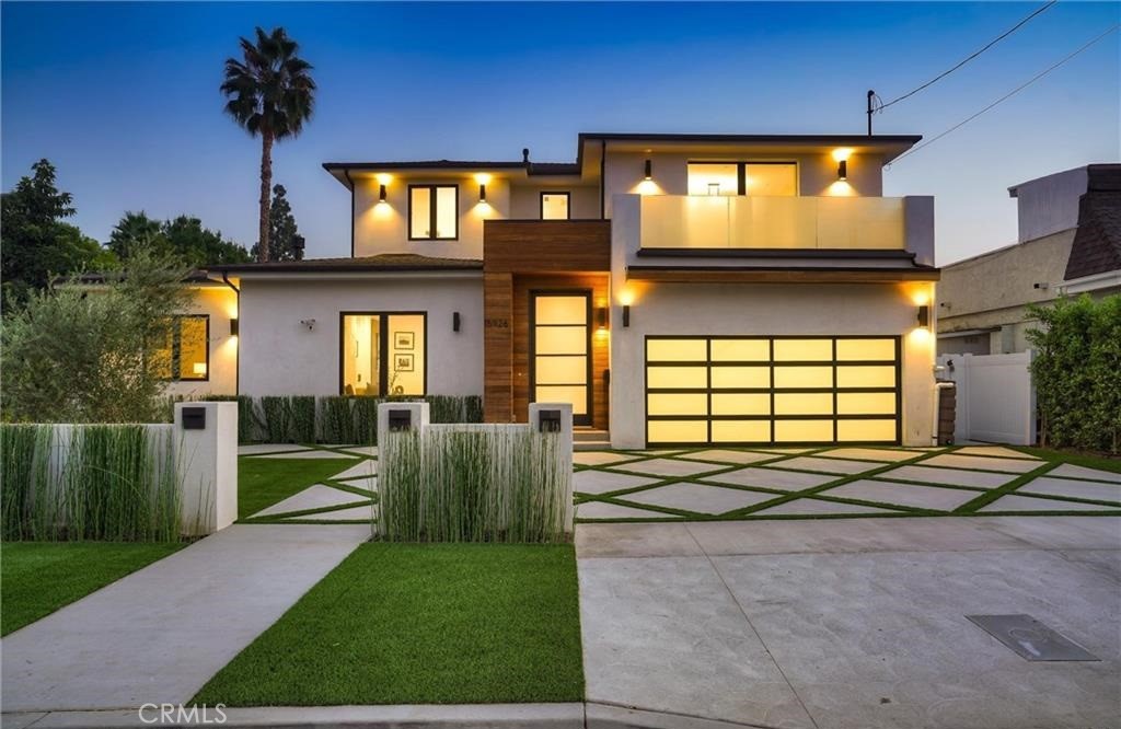 15926 Morrison Street Encino, CA 91436 - Photo 1 of 67 a front view of a house with a yard