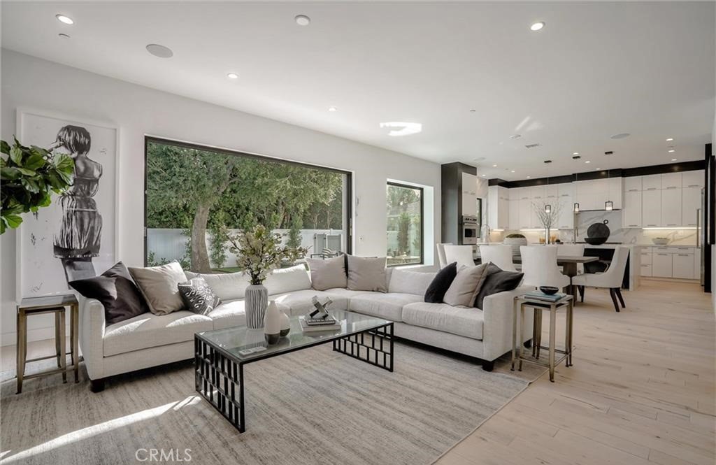 15926 Morrison Street Encino, CA 91436 - Photo 11 of 67 a living room with furniture and a large window