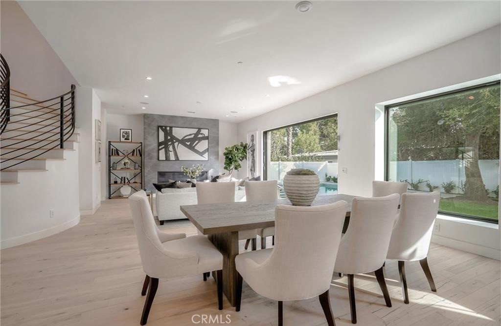 15926 Morrison Street Encino, CA 91436 - Photo 20 of 67 a view of a dining room with furniture window and wooden floor