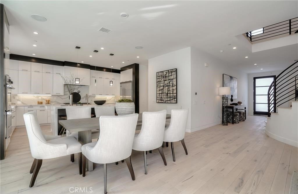 15926 Morrison Street Encino, CA 91436 - Photo 22 of 67 a view of a dining room with furniture