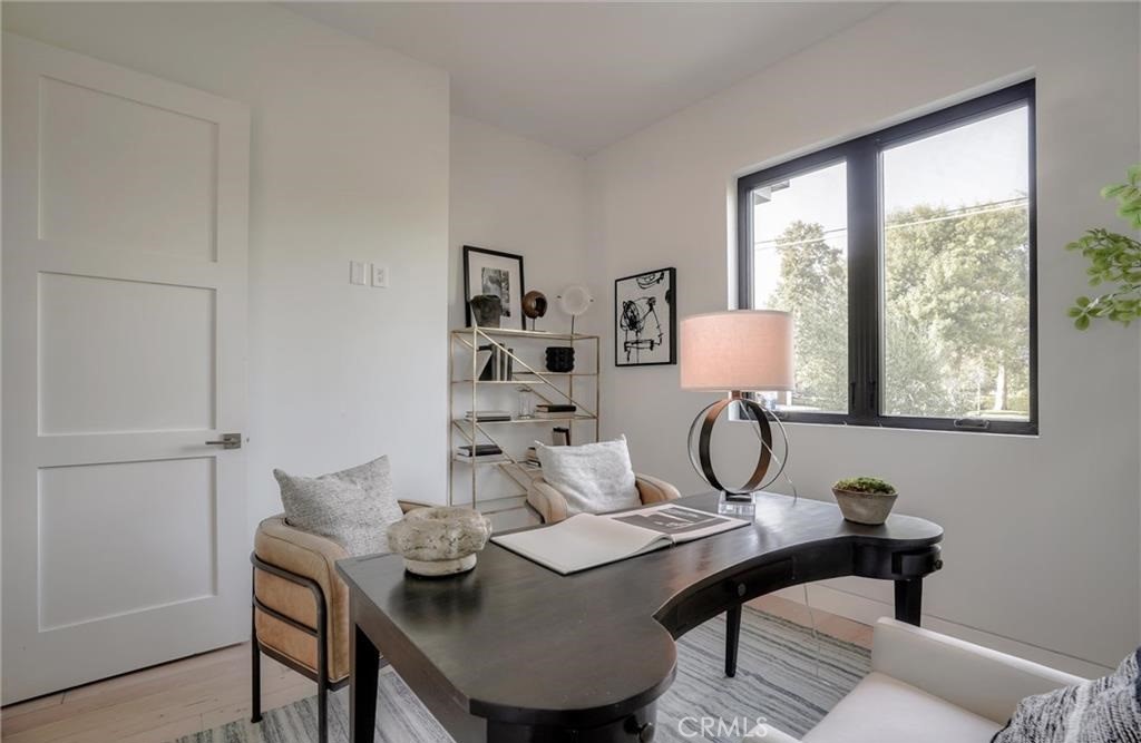 15926 Morrison Street Encino, CA 91436 - Photo 24 of 67 a view of a workspace with furniture and window