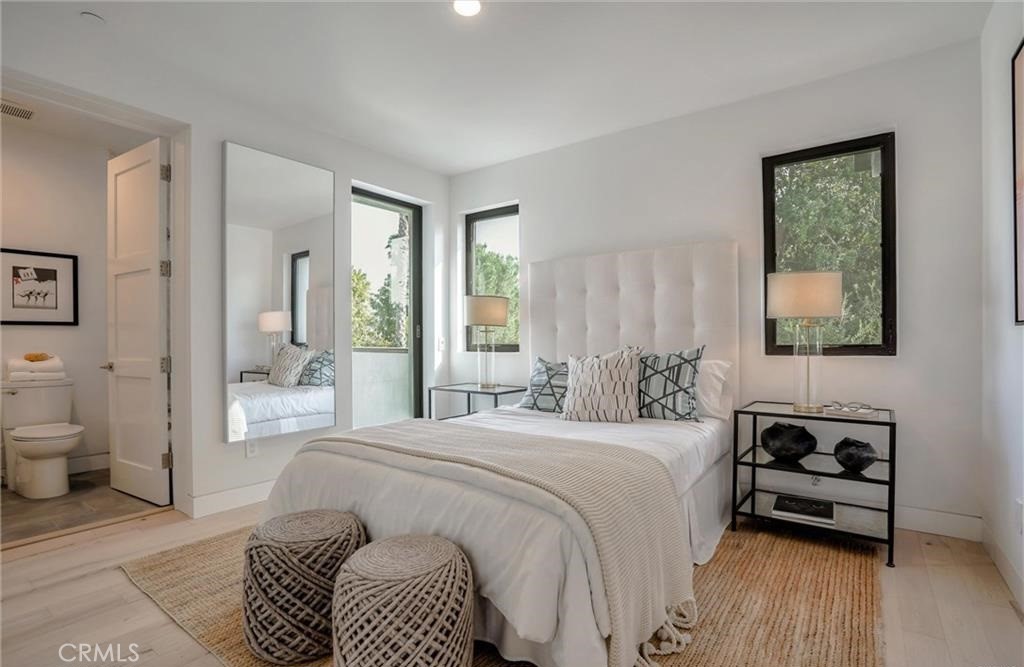 15926 Morrison Street Encino, CA 91436 - Photo 32 of 67 a bedroom with a bed and a window