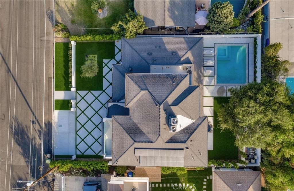 15926 Morrison Street Encino, CA 91436 - Photo 4 of 67 an aerial view of a house with a yard and potted plants
