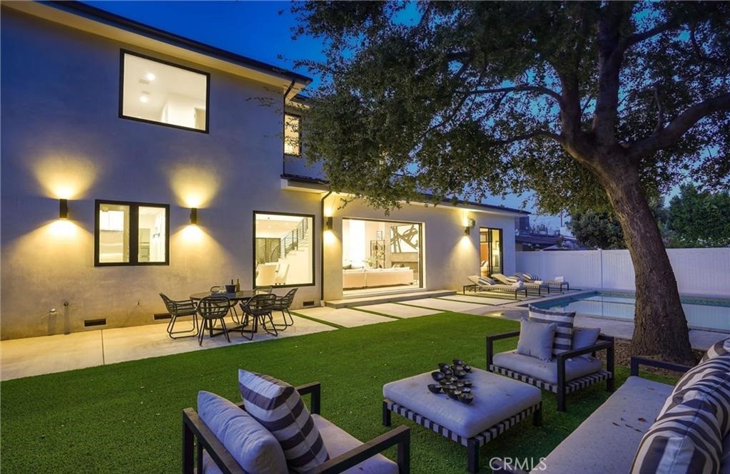 15926 Morrison Street Encino, CA 91436 - Photo 46 of 67 a view of a chairs and table in the patio