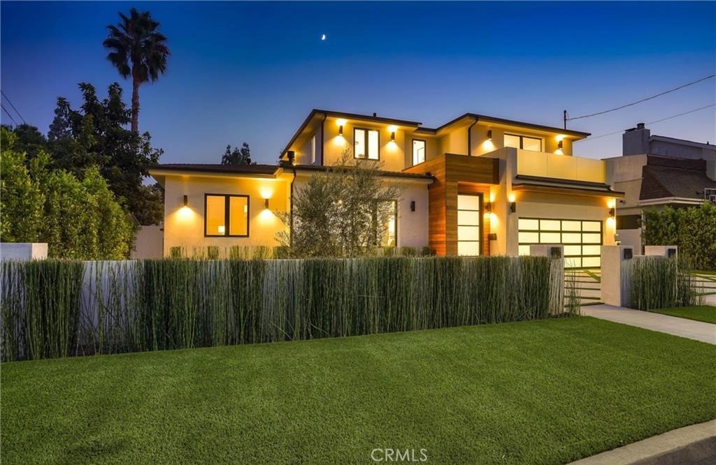 15926 Morrison Street Encino, CA 91436 - Photo 54 of 67 a view of a house with a yard