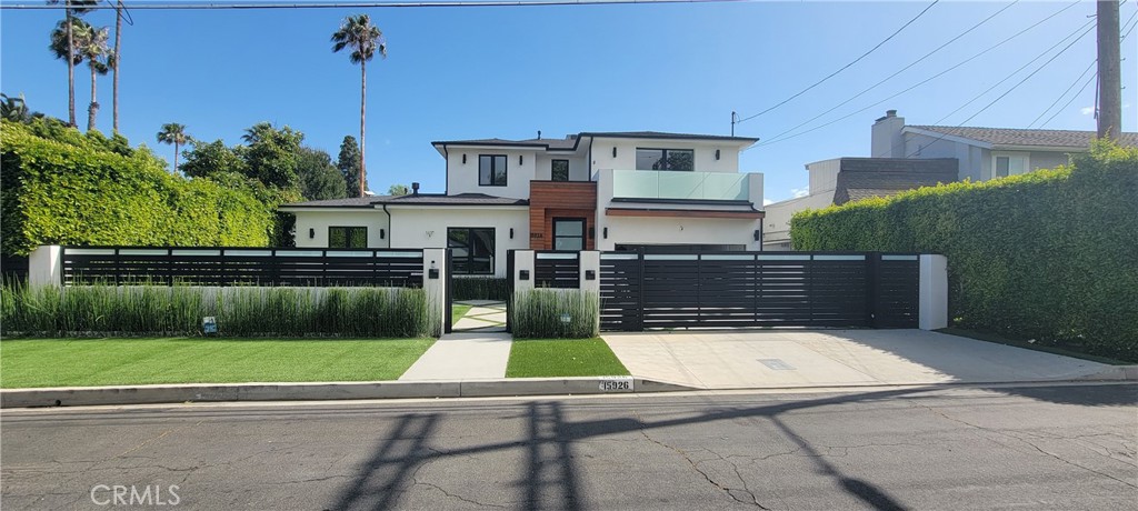 15926 Morrison Street Encino, CA 91436 - Photo 63 of 67 a view of a house with a swimming pool