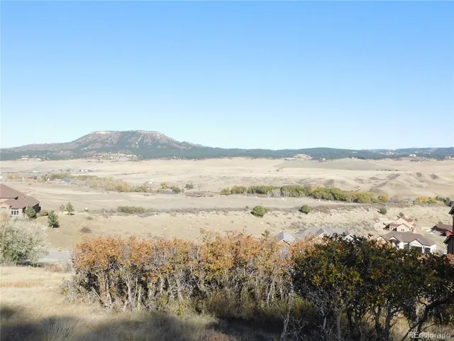 a view of a lake with a mountain
