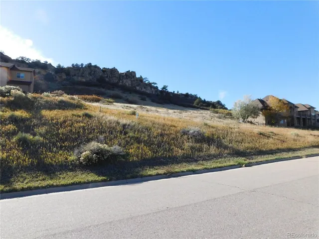 a view of swimming pool with a yard