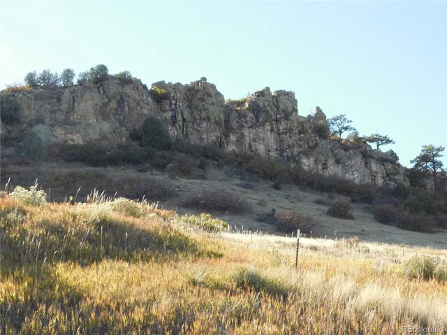 a view of ocean and mountain