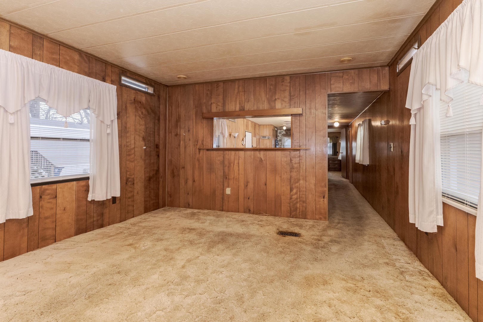7 Oak Valley Road Bloomington, IL 61704 - Photo 12 of 27 a view of a hallway with wooden floor and staircase